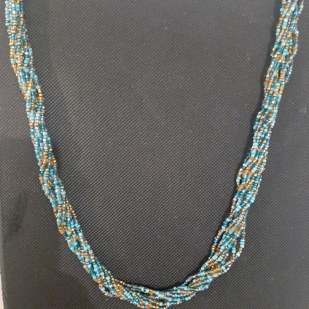 Beautiful teal, cooper, lite and qclear teal Bead